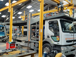 réparation hydraulique camion plateau transport d'automobiles